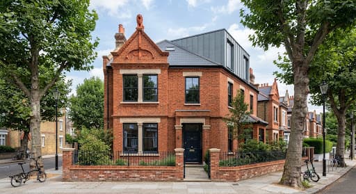 Renovated Lion House in Peterborough Estate, Fulham, displaying refined architectural brickwork